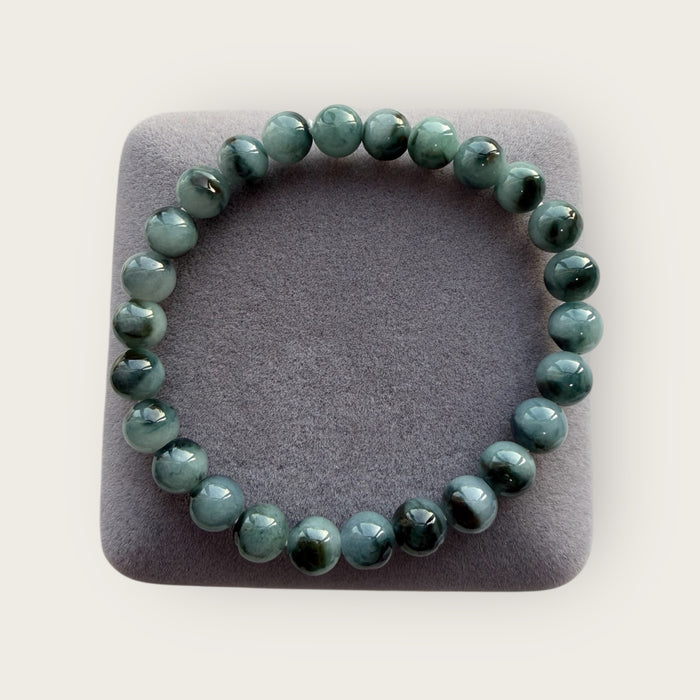 Dark Denim Blue Floating Flowers Jadeite Bead Bracelet