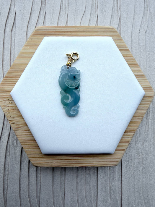 Dreamy Jade carved jadeite dragon pendant charm with a polished blue-green finish and gold-tone clasp.