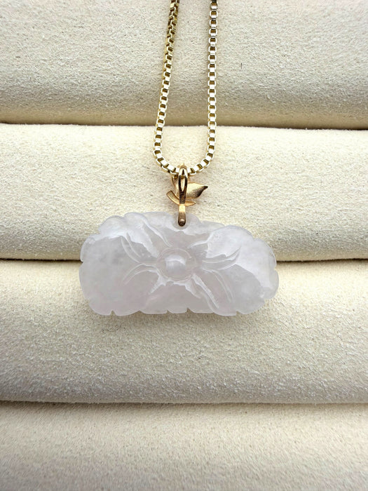 Dreamy Jade elegant white translucent carved floral jade pendant necklace with a gold leaf bail and gold box chain.