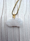 Dreamy Jade white carved floral jade pendant necklace with a gold leaf bail on a gold box chain