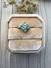 Dreamy Jade clover-inspired ring featuring mint green jade stones and sparkling accents in a silver setting