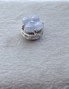 Dreamy Jade floral charm featuring icy-blue jade clover petals and a sparkling accent stone set in sterling silver.
