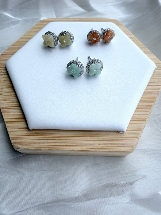 Dreamy Jade floral stud earrings featuring gemstone centres and crystal halos in green, orange, and pale yellow