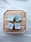 Dreamy Jade floral stud earrings featuring carved light green and lavender jade petals with a central sparkling stone.