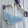 Dreamy Jade icy-lavender jadeite pendant with hand-carved floral motif on a purple braided cord with pearls and gold.