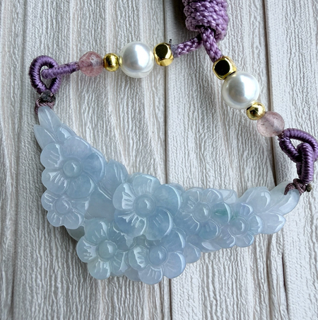 Dreamy Jade icy-lavender jadeite pendant with hand-carved floral motif on a purple braided cord with pearls and gold.