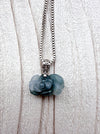 Dreamy Jade floral pendant necklace featuring a carved natural green jade rose on a polished silver box chain.