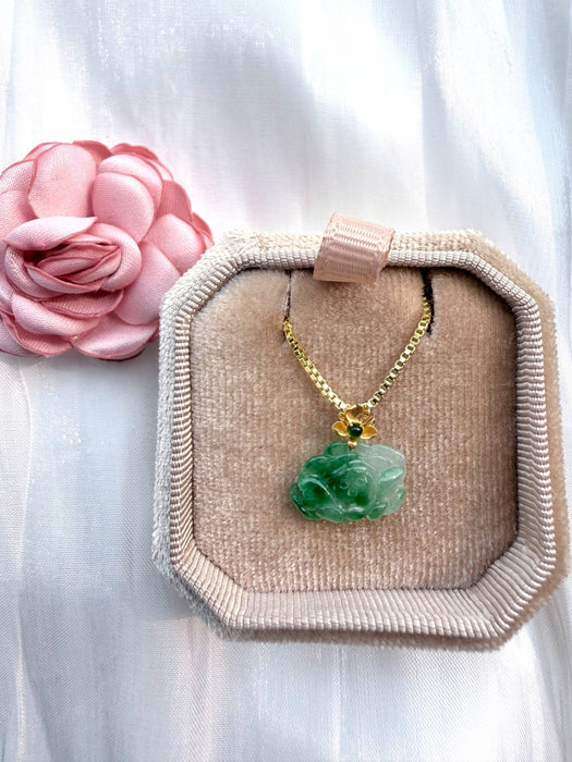 Dreamy Jade floral pendant necklace featuring carved green jade on a gold-tone box chain inside a velvet jewellery box