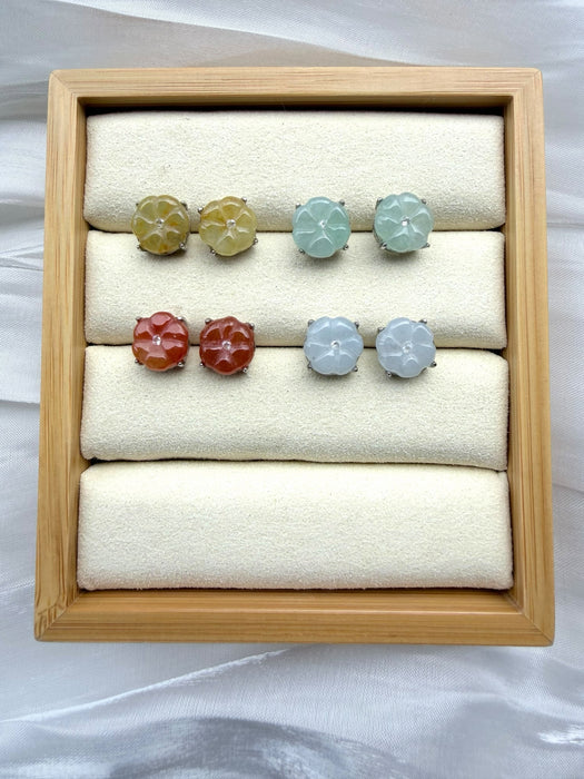 Dreamy Jade floral stud earrings in yellow, mint green, sunset red, and icy white jade set in polished metal.