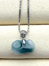 Dreamy Jade pendant necklace featuring a carved deep green natural jade stone on a silver box chain