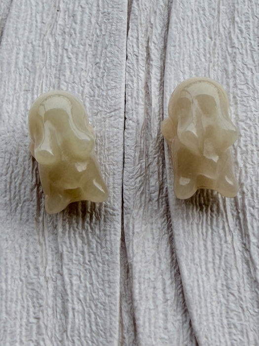 Dreamy Jade hand-carved off-white jade rabbit beads with a smooth polished finish for jewellery making.