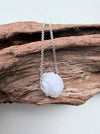 Dreamy Jade lavender jade pendant necklace with hand-carved floral motif on a minimalist silver-tone chain
