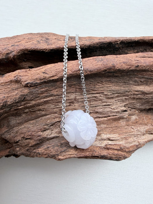Dreamy Jade lavender jade pendant necklace with hand-carved floral motif on a minimalist silver-tone chain