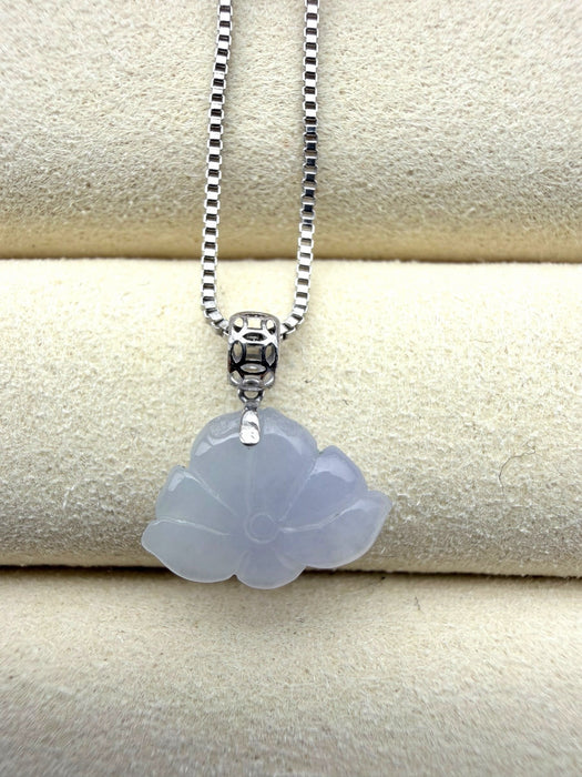 Dreamy Jade lavender jadeite pendant carved in a floral motif with a silver coin-inspired bail on a box chain.