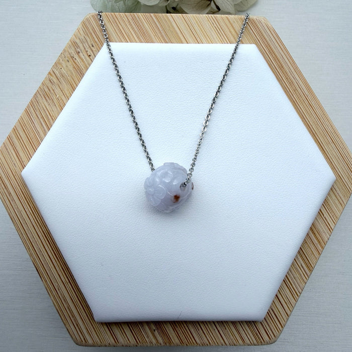 Dreamy Jade lavender jade pendant necklace with hand-carved floral motif on a minimalist silver-tone chain
