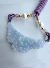 Dreamy Jade hand carved icy-lavender jadeite floral pendant on a purple braided cord with pearls and gold accents.