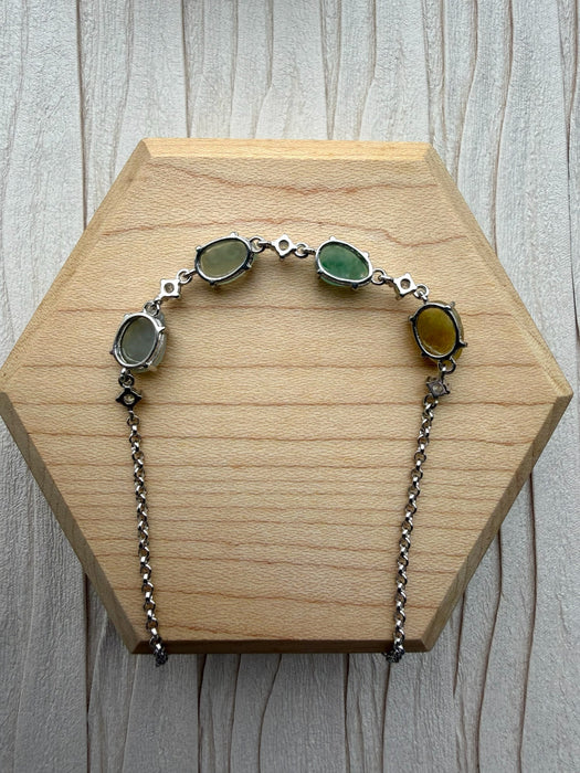 Dreamy Jade multi-coloured jade gemstone link bracelet with sterling silver chain and cubic zirconia accents.