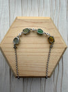 Dreamy Jade multi-coloured jade gemstone link bracelet with sterling silver chain and cubic zirconia accents.