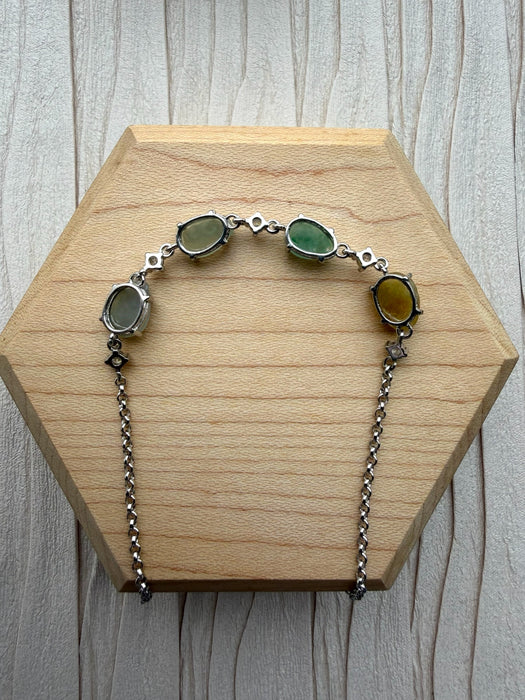 Dreamy Jade multi-coloured jade gemstone link bracelet with sterling silver chain and cubic zirconia accents.