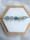 Dreamy Jade multi-coloured gemstone floral link bracelet with five unique jade beads in polished silver-tone settings.