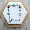 Dreamy Jade sterling silver chain bracelet featuring colourful star-shaped jade stones and prosperity coin charms.
