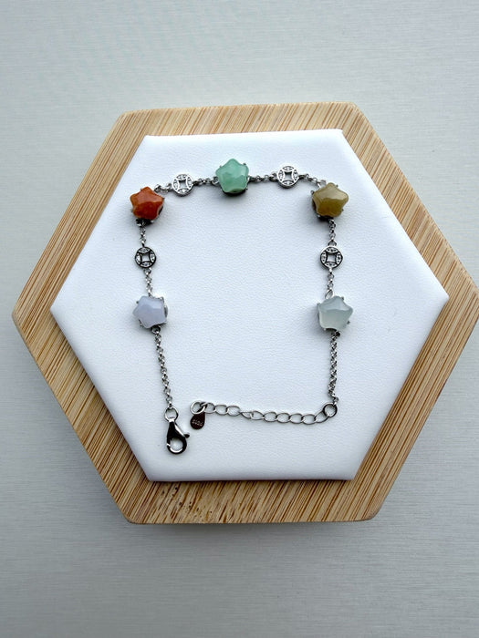 Dreamy Jade sterling silver chain bracelet featuring multi-coloured star-shaped jade stones and coin charms.