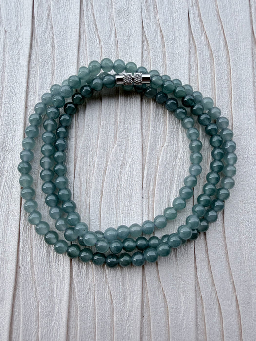 Dreamy Jade multi-strand bracelet featuring smooth translucent sea-green jade beads and a polished magnetic clasp.