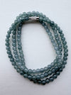 Dreamy Jade multi-strand bracelet featuring smooth sea-green jade beads and a polished metallic magnetic clasp.
