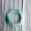 Dreamy Jade elegant natural jadeite ring with translucent white base and vibrant emerald green splashes