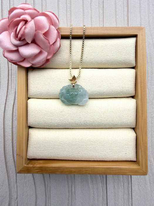 Dreamy Jade peony pendant necklace in translucent green jade with a gold-tone leaf bail on a delicate box chain.