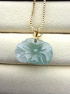 Dreamy Jade peony pendant necklace in translucent green jade with a gold-tone leaf bail on a sleek box chain.