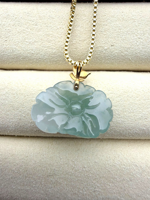 Dreamy Jade peony pendant necklace in translucent green jade with a gold-tone leaf bail on a sleek box chain.