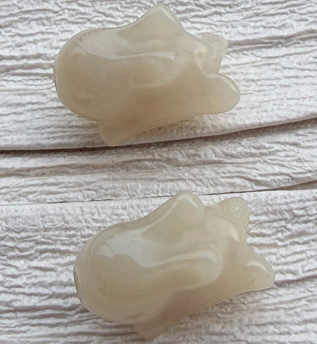 Dreamy Jade hand-carved off-white natural jade rabbit beads with a smooth polished finish for jewellery making.