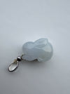 Dreamy Jade rabbit pendant carved from translucent light grey jade with a polished silver-tone bail on a white surface.