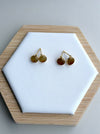 Dreamy Jade round stud earrings featuring warm-toned jade stones in gold-tone settings with sparkling accent details.
