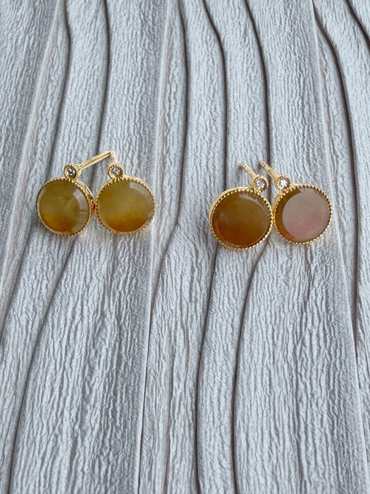 Dreamy Jade round stud earrings featuring warm-toned jade stones in gold-tone settings with sparkling accent crystals.