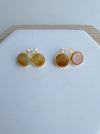 Dreamy Jade round stud earrings featuring warm-toned jade stones in gold-tone settings with sparkling accent stones.