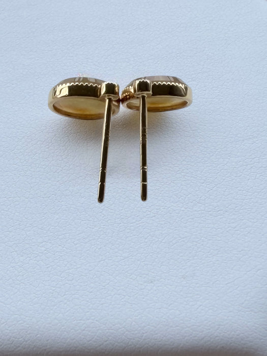 Dreamy Jade round stud earrings featuring warm-toned jade stones in gold-tone settings with beaded edges