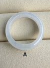 Dreamy Jade minimalist circular ring band in polished translucent white jadeite stone