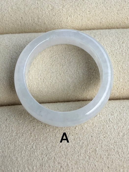 Dreamy Jade minimalist circular ring band in polished translucent white jadeite stone